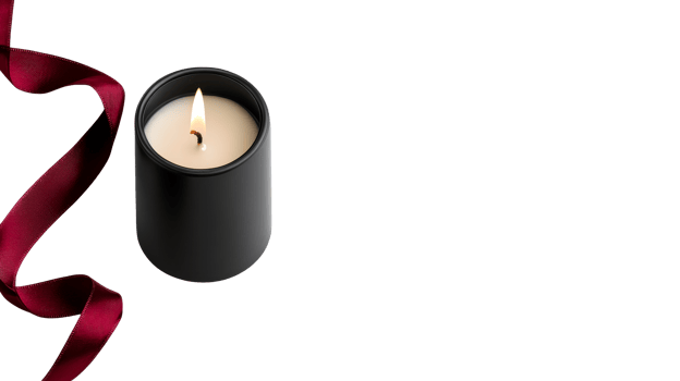 Candle burning in a black jar with red ribbon, cut out transparent png