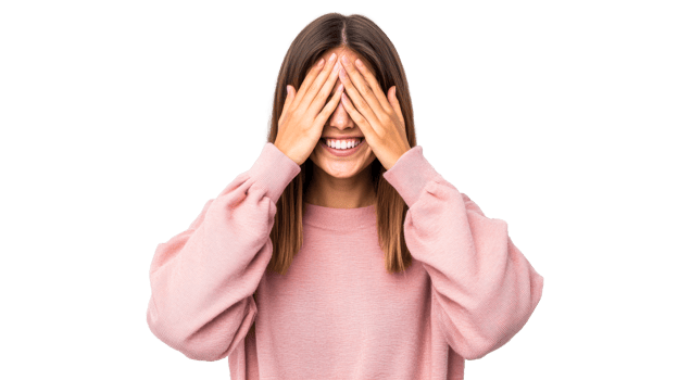 Happy woman covering eyes with hands and smiling, cut out transparent png