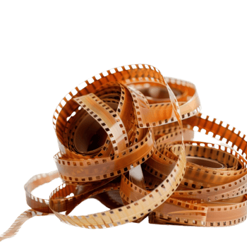 Vintage Film Strips in Various Positions Capturing Nostalgic Photography Moments png