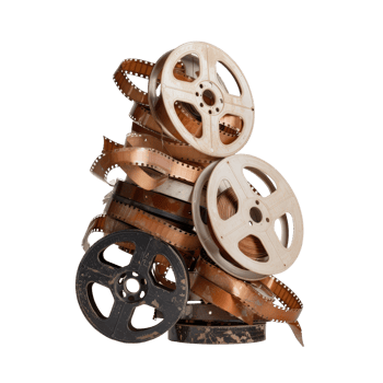 Vintage Film Reels Stacked in Artistic Arrangement Showcasing Classic Cinematic Heritage png