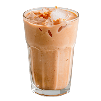 Refreshing iced beverage in a clear glass with ice and a creamy texture and nutty topping png