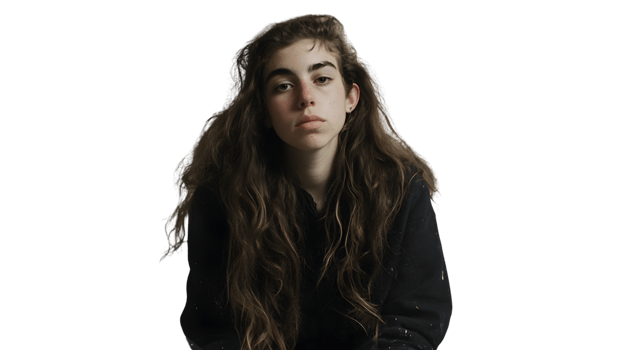 A young individual with long wavy hair wearing a black hoodie against a dark background png