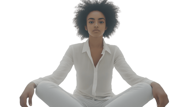 Elegant Individual in White Attire Sitting CrossLegged with Natural Hair Style Ideal for Well png