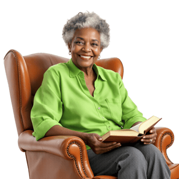 An older woman sitting in an armchair reading a book png