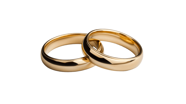 Two golden wedding rings on dark background, cut out transparent png