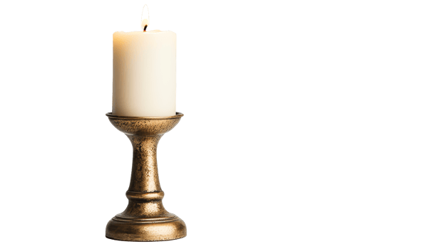 Lit candle in gold candle holder on black background, cut out transparent png
