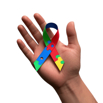 Autism Awareness Ribbon Held In Hand Isolated On Transparent Background png