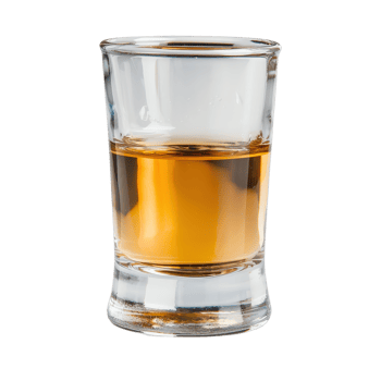 Clear shot glass filled with amber liquid on a . showcasing alcohol beverage png