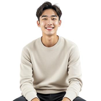 A man in a sweater sitting on a black background png