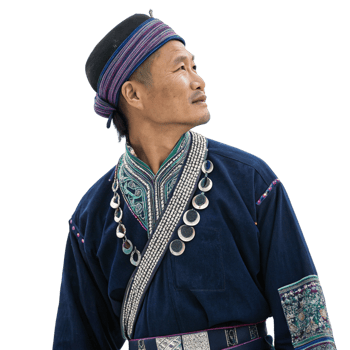 Arealistic photo of an hmong man in dark indigo attire cultural setting portrait traditional context close-up view heritage representation png