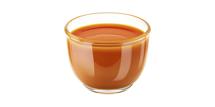 Glass Of Caramel Sauce. Sweet Dessert Topping For Culinary Use Isolated On Transparent Background png
