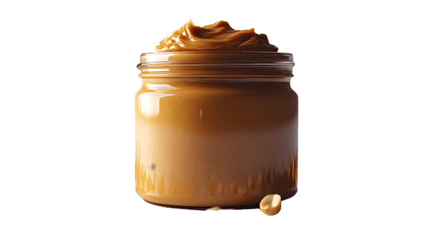 A jar overflowing with creamy spread surrounded by whole nuts perfect for culinary and food p png