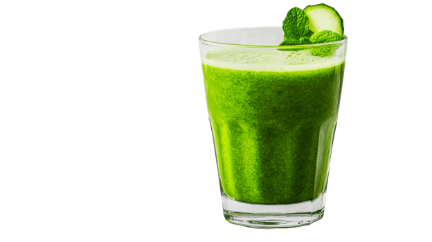 Green smoothie in glass with mint garnish, cut out transparent png