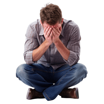 Man sitting with hands covering his face in distress, expressing frustration and emotional exhaustion, isolated on white png