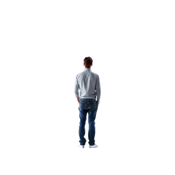 Man standing alone, facing away from the viewer, expressing solitude and personal reflection in a dark, empty setting png