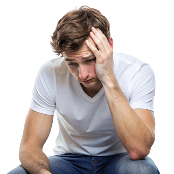 Regretful young man sitting with his head in his hand, looking down in sadness and contemplation png