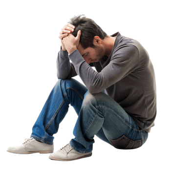 Sad young man sitting on the floor, holding his head in his hands, showing deep frustration and vulnerability in isolation png