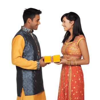 A man and woman in traditional indian clothing holding a box png