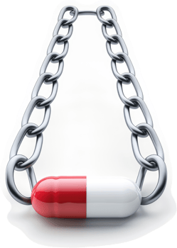 A metallic chain encircles a vibrant red and white pill. png