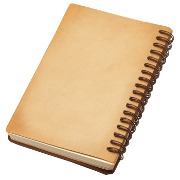 Aged spiral-bound notebook rests on a plain background. png