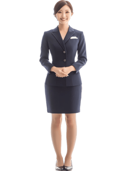 Smiling Young Woman in Navy Business Suit Stands with Hands Clasped against Transparent Background png