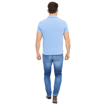 A man in light blue shirt and jeans walks away, showcasing casual style. image captures rear view, emphasizing relaxed fit and everyday fashion png