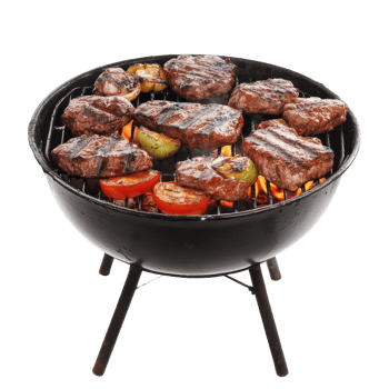 Grilled beef steaks and vegetables on a portable charcoal grill. png