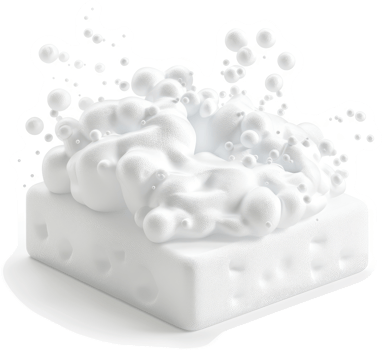 Creamy milk froth erupts from a block of white cheese. png