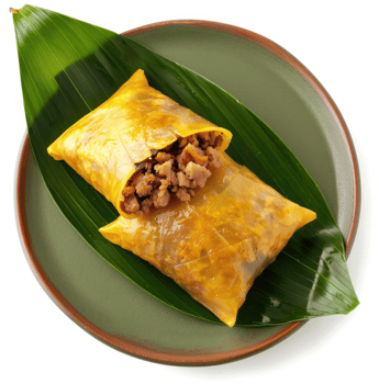 Golden, savory minced pork parcels on a banana leaf. png
