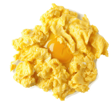 A dish of scrambled eggs with a visible yolk. png