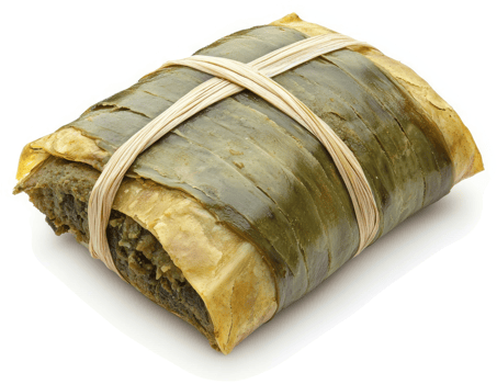 A savory dish wrapped in banana leaves. png