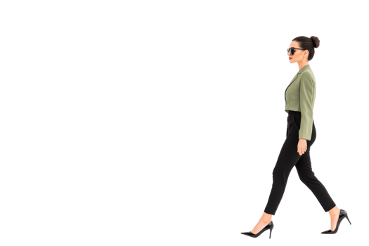 A woman in green jacket and black pants confidently walks forward, wearing sunglasses and high heels. Her hair is styled in bun, and she exudes sense of style and determination png