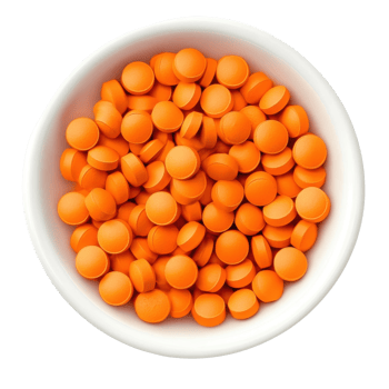 Orange pills in a bowl on transparent background png
