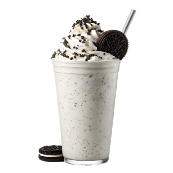 Creamy milkshake topped with whipped cream and chocolate cookies png