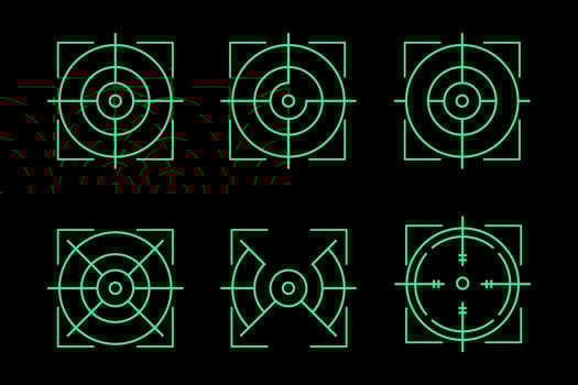 a set of green targets on a black background vector