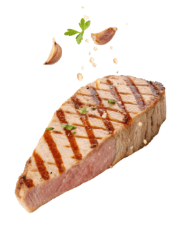 Grilled tuna steak with garlic and herbs seasoning fresh and delicious seafood meal with tender texture and appetizing presentation png