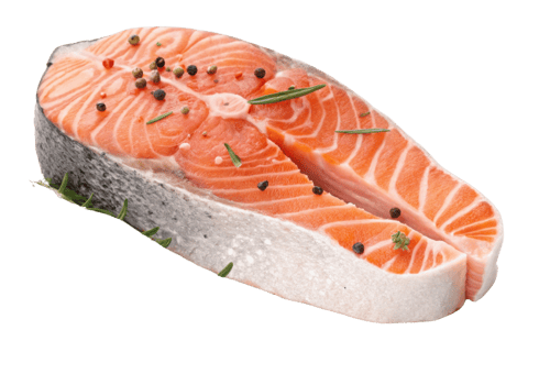 Salmon steak with fresh herbs and peppercorns ready for cooking or grilling with vibrant orange color and natural texture png