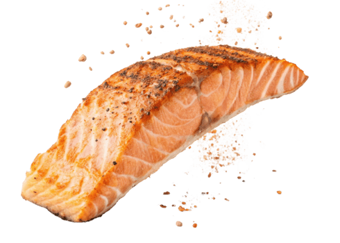 Grilled salmon fillet with seasoning and spices sprinkled around, showcasing delicious and healthy seafood meal with crispy texture png
