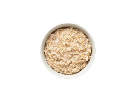A simple comforting bowl of plain creamy oatmeal porridge viewed from above for breakfast png
