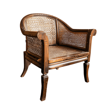 Vintage wooden chair with cane backrest and seat, showcasing intricate craftsmanship and classic design that adds elegance to any space. Perfect for traditional or rustic decor png