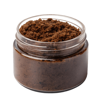 Coffee scrub in clear glass jar, organic exfoliating skincare with ground coffee, natural body care product png
