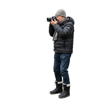 A photographer taking photos outdoor with professional camera equipment png