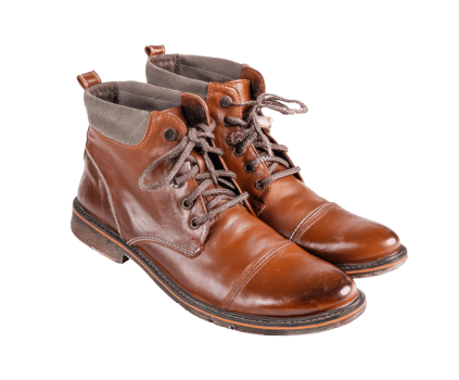 Chic brown leather ankle boots for casual or outdoor use png