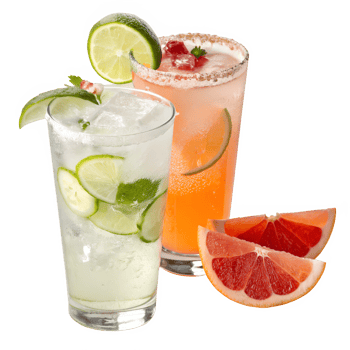 Two drinks with slices of grapefruit and lime png