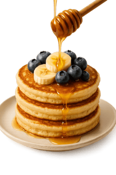 Delicious Stack of Pancakes Topped With Honey, Bananas, and Blueberries for a Hearty Breakfast png