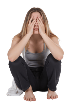 A caucasian woman, 22 years old, with blonde hair, covering her face with her hands, wearing a gray tank top and black pants, in a transparent background png