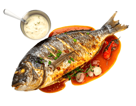 whole grilled fish with crispy skin, served with spicy tomato sauce, vegetables and creamy white dipping sauce, on isolated background png