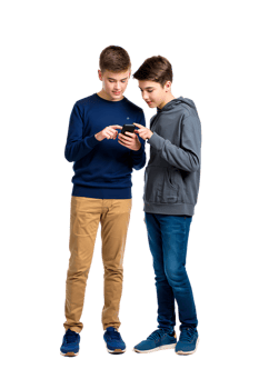 Two teenage boys looking at a smartphone together sharing content against a plain background indoors png