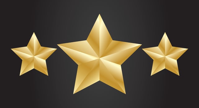 Metallic golden stars isolated on black background vector