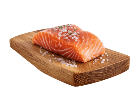 Fresh salmon fillet with sea salt on wooden board for cooking png